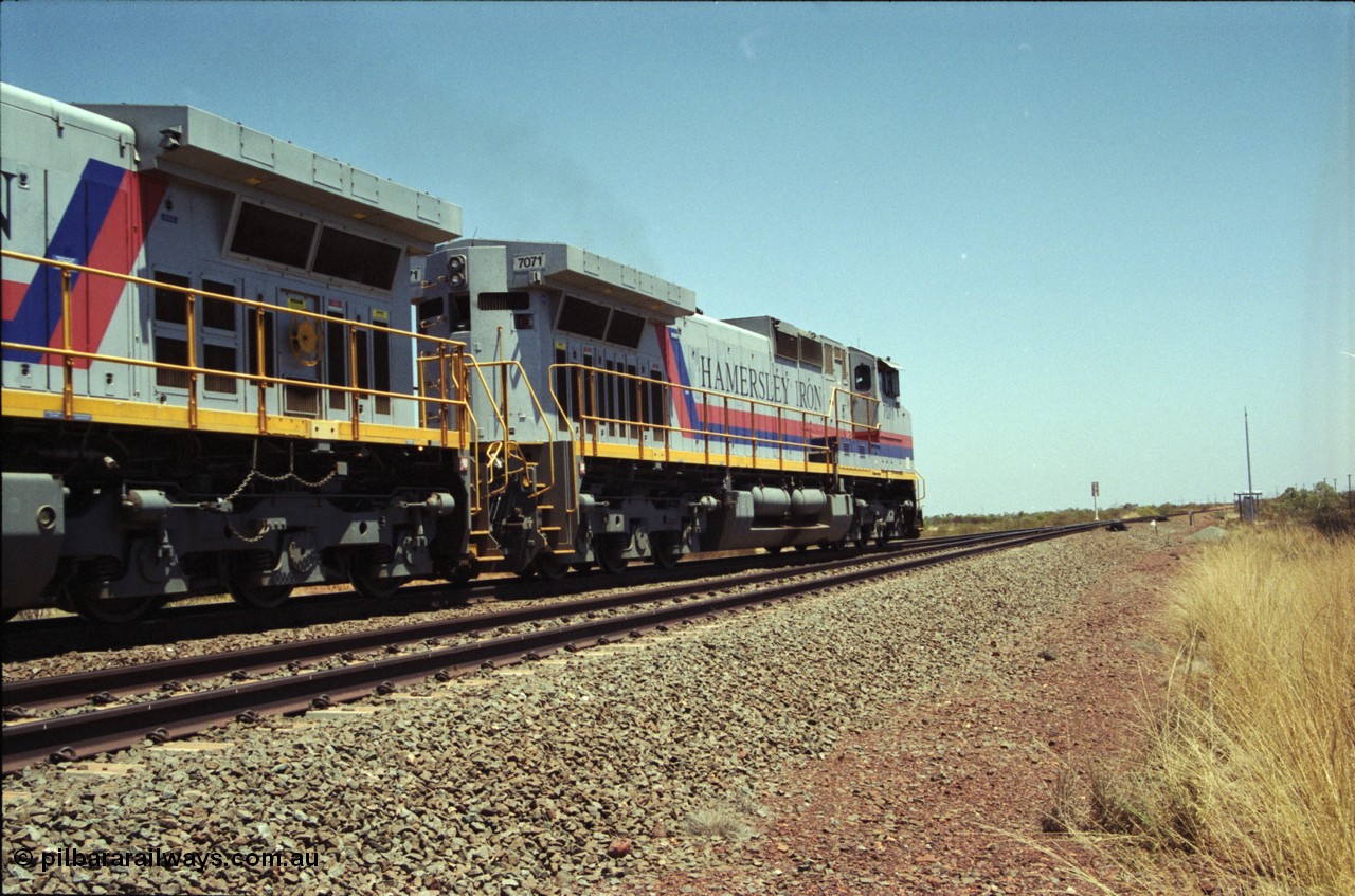 222-33
Somewhere on the original single line section between Gull and Rosella Hamersley Iron 7071 serial 47750 a General Electric Dash 9-44CW built by GE at Erie brings a loaded train away from the passing track back onto the mainline following a crew change with second unit 7066.
Keywords: 7071;GE;Dash-9-44CW;47750;