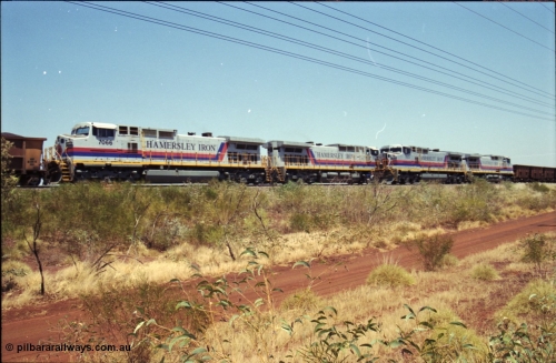 222-27
Somewhere on the original single line section between Gull and Rosella Hamersley Iron 7073 serial 47752 a General Electric Dash 9-44CW built by GE at Erie with 7091 has stopped for a crew change besides a loaded headed up by 7071.
Keywords: 7073;GE;Dash-9-44CW;47752;