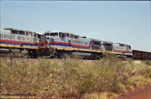 222-28
Somewhere on the original single line section between Gull and Rosella Hamersley Iron 7073 serial 47752 a General Electric Dash 9-44CW built by GE at Erie with 7091 has stopped for a crew change besides a loaded headed up by 7071.
Keywords: 7066;GE;Dash-9-44CW;47745;