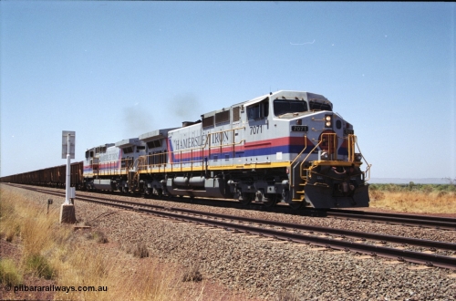 222-32
Somewhere on the original single line section between Gull and Rosella Hamersley Iron 7071 serial 47750 a General Electric Dash 9-44CW built by GE at Erie brings a loaded train away from the passing track back onto the mainline following a crew change with second unit 7066.
Keywords: 7071;GE;Dash-9-44CW;47750;