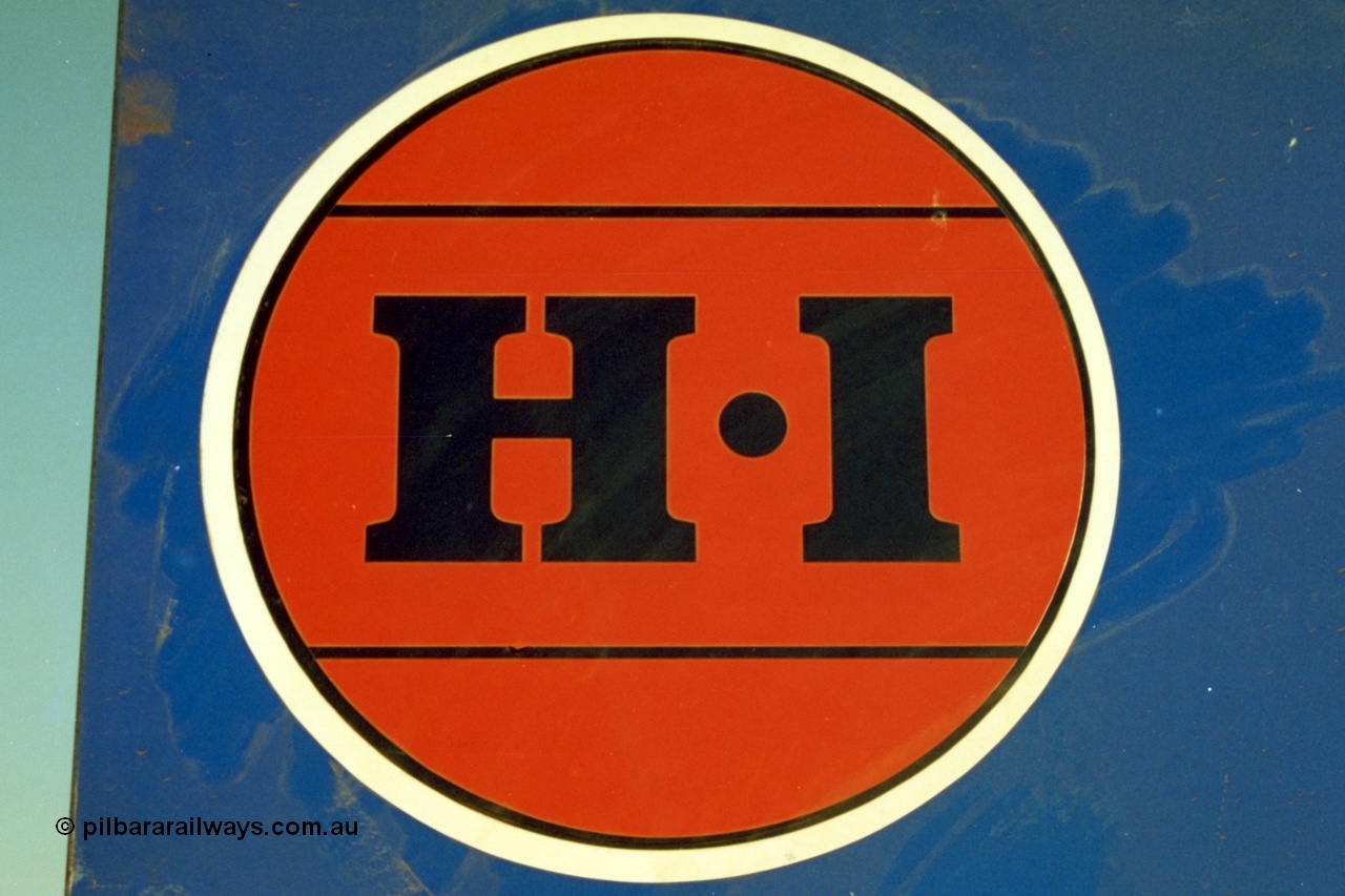 223-01
The HI red dot logo for Hamersley Iron on a sign near Rosella Siding. 21st October 2000.
