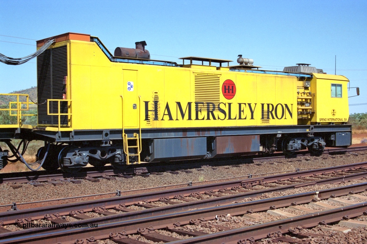 223-08
Possum Siding, Hamersley Iron rail grinder, view of main generating lead unit, Speno built RR 48 M-1 model sits in the back track siding. 21st October 2000.
Keywords: Speno;RR48;M1;rail-grinder;