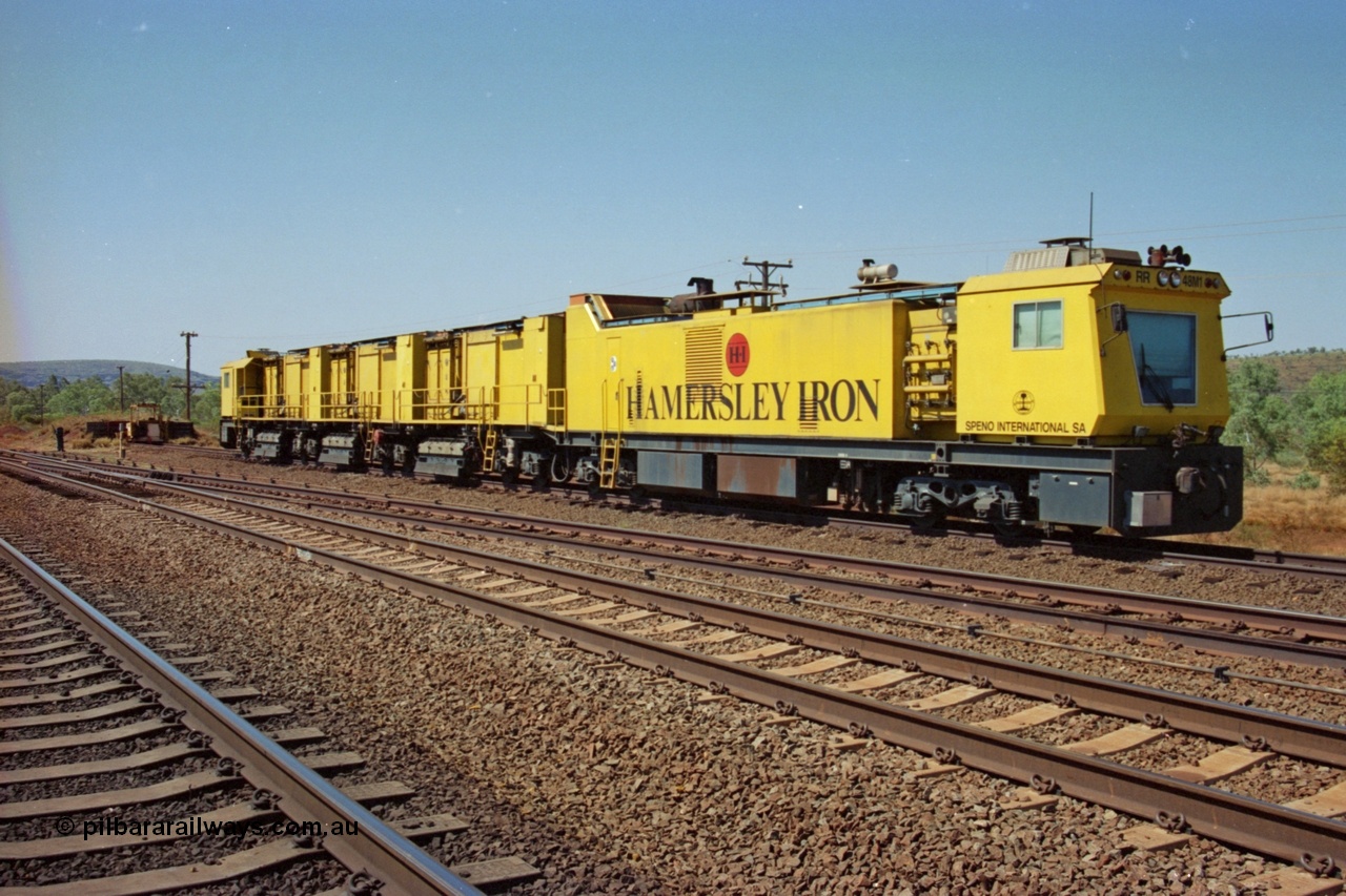 223-09
Possum Siding, Hamersley Iron rail grinder, Speno built RR 48 M-1 model sits in the back track siding. 21st October 2000.
Keywords: Speno;RR48;M1;rail-grinder;