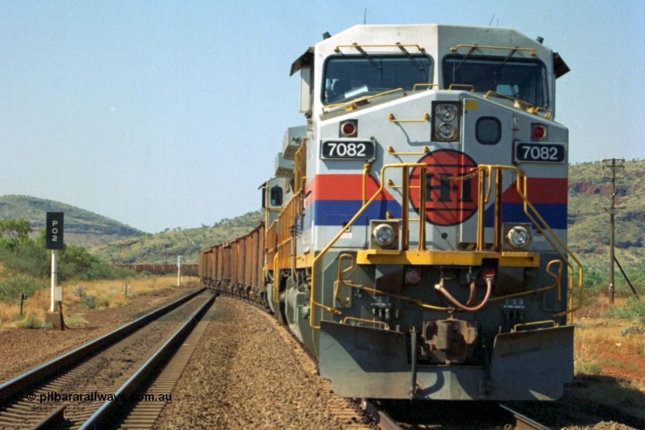 223-21
Possum Siding, Hamersley Iron loco 7082 a General Electric built Dash 9-44CW serial 47761 leads sister unit 7080 with an empty train just inside the loop waiting to effect a crew change. 21st October 2000.
Keywords: 7082;GE;Dash-9-44CW;47761;