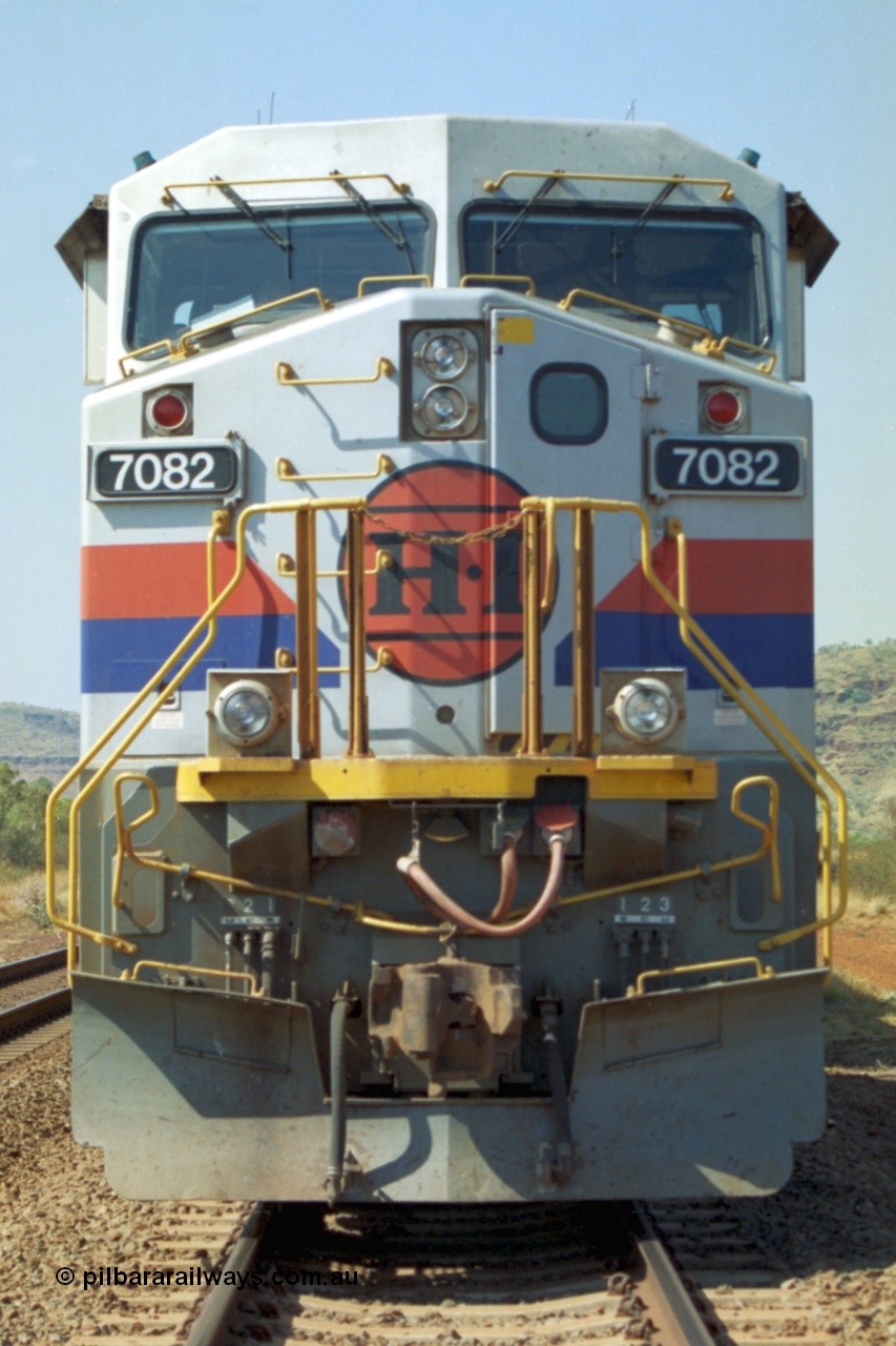 223-22
Possum Siding, Hamersley Iron loco 7082 a General Electric built Dash 9-44CW serial 47761 leads sister unit 7080 with an empty train just inside the loop waiting to effect a crew change. 21st October 2000
Keywords: 7082;GE;Dash-9-44CW;47761;