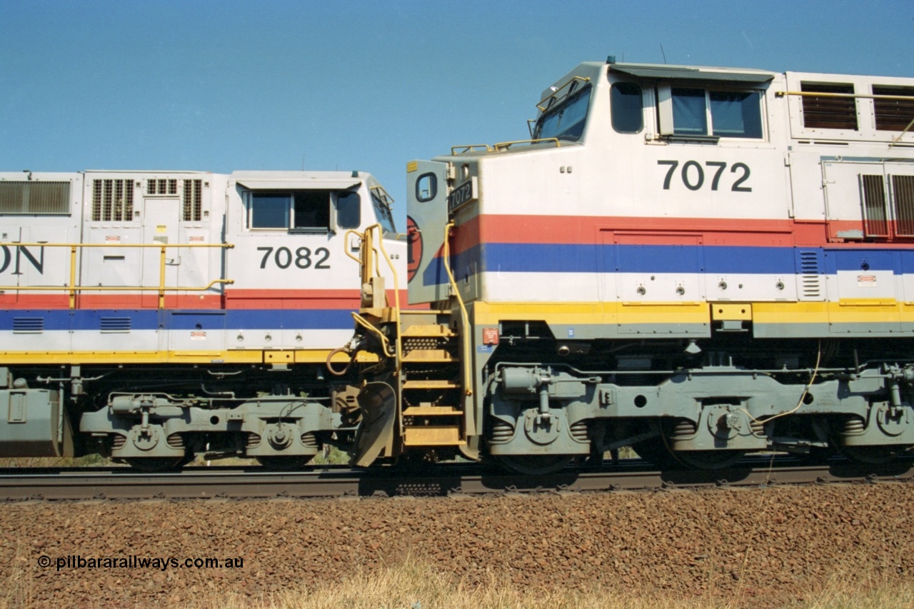 223-26
Possum Siding, Hamersley Iron locos built by General Electric model Dash 9-44CW units 7072 serial 47751 with 210 waggons loaded ex Marandoo changes crew with sister loco 7082 serial 47761 on an empty at 1500 hrs 21st October 2000.
Keywords: 7072;GE;Dash-9-44CW;47751;