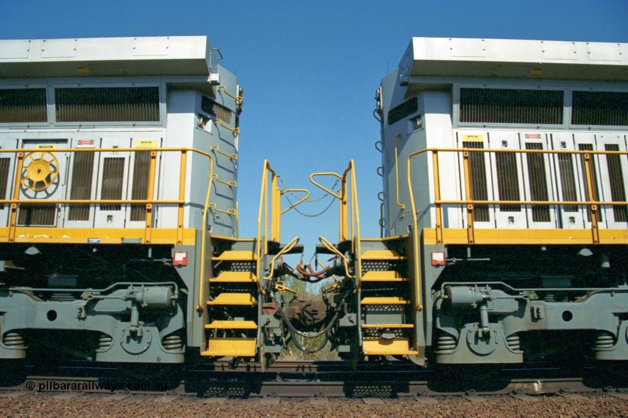 223-27
Possum Siding, the no 2 or B ends of a pair of Hamersley Iron General Electric built Dash 9-44CW locomotives 7072 and 7074. 1500 hrs 21st October 2000.
Keywords: 7072;GE;Dash-9-44CW;47751;