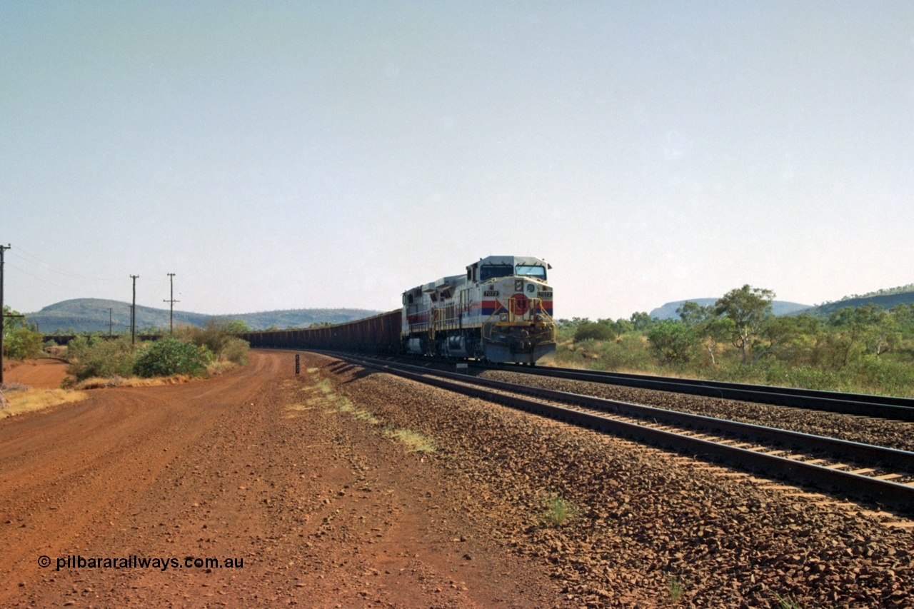 223-35
Possum Siding 227 km, a loaded train behind a pair of Hamersley Iron General Electric built Dash 9-44CW units 7072 serial 47751 and 7074 serial 47753 on a loaded train ex Marandoo holds the mainline awaiting clearance north. 21st October 2000.
Keywords: 7072;GE;Dash-9-44CW;47751;