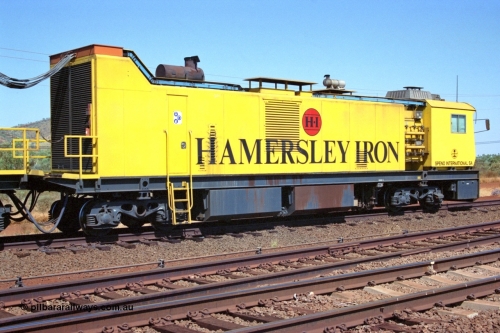 223-08
Possum Siding, Hamersley Iron rail grinder, view of main generating lead unit, Speno built RR 48 M-1 model sits in the back track siding. 21st October 2000.
Keywords: Speno;RR48;M1;rail-grinder;