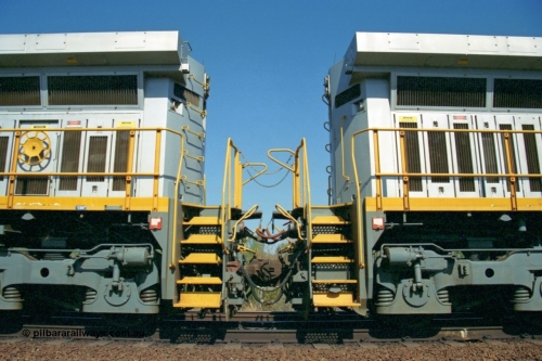 223-27
Possum Siding, the no 2 or B ends of a pair of Hamersley Iron General Electric built Dash 9-44CW locomotives 7072 and 7074. 1500 hrs 21st October 2000.
Keywords: 7072;GE;Dash-9-44CW;47751;