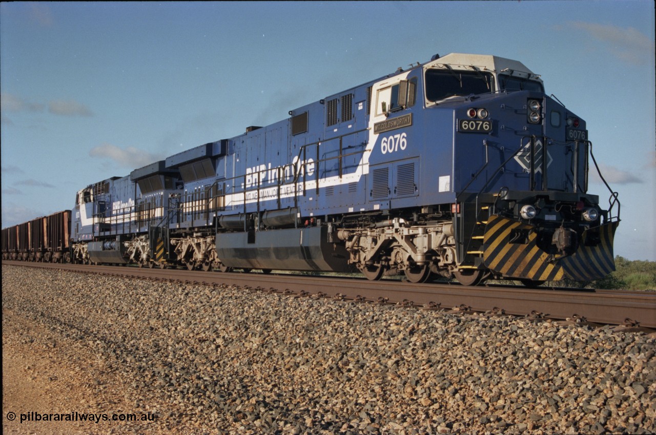 224-17
Bing siding, 6076 'Mt Goldsworthy' serial 51068 a General Electric AC6000 built by GE at Erie awaits the road to depart south. [url=https://goo.gl/maps/KQrczNpVhAH2]GeoData[/url].
Keywords: 6076;GE;AC6000;51068;