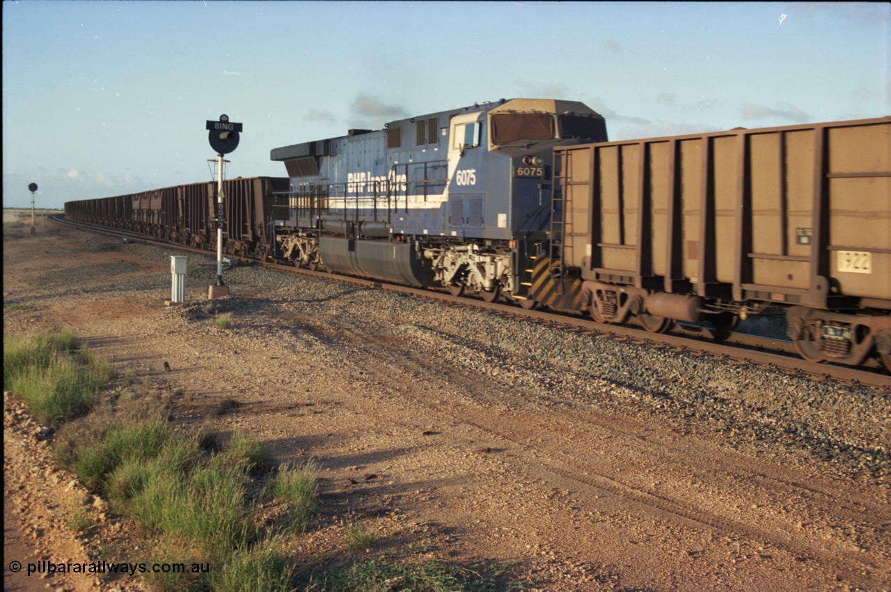 224-36
Bing siding, mid-train remote on the afternoon Yandi departure 6075 serial 51067 a General Electric AC6000 built by GE at Erie departs south. [url=https://goo.gl/maps/KQrczNpVhAH2]GeoData[/url].
Keywords: 6075;GE;AC6000;51067;