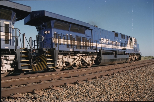 224-07
Bing siding, 6076 'Mt Goldsworthy' serial 51068 a General Electric AC6000 built by GE at Erie awaits the road to depart south. [url=https://goo.gl/maps/KQrczNpVhAH2]GeoData[/url].
Keywords: 6076;GE;AC6000CW;51068;