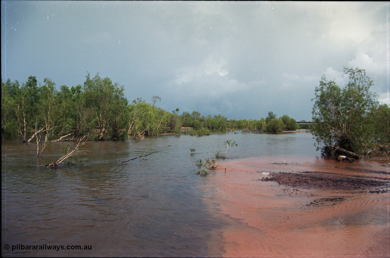 225-00
Walla siding area, the East Turner River is in flood, flowing with the bridge at the 55.5 km in the background.
