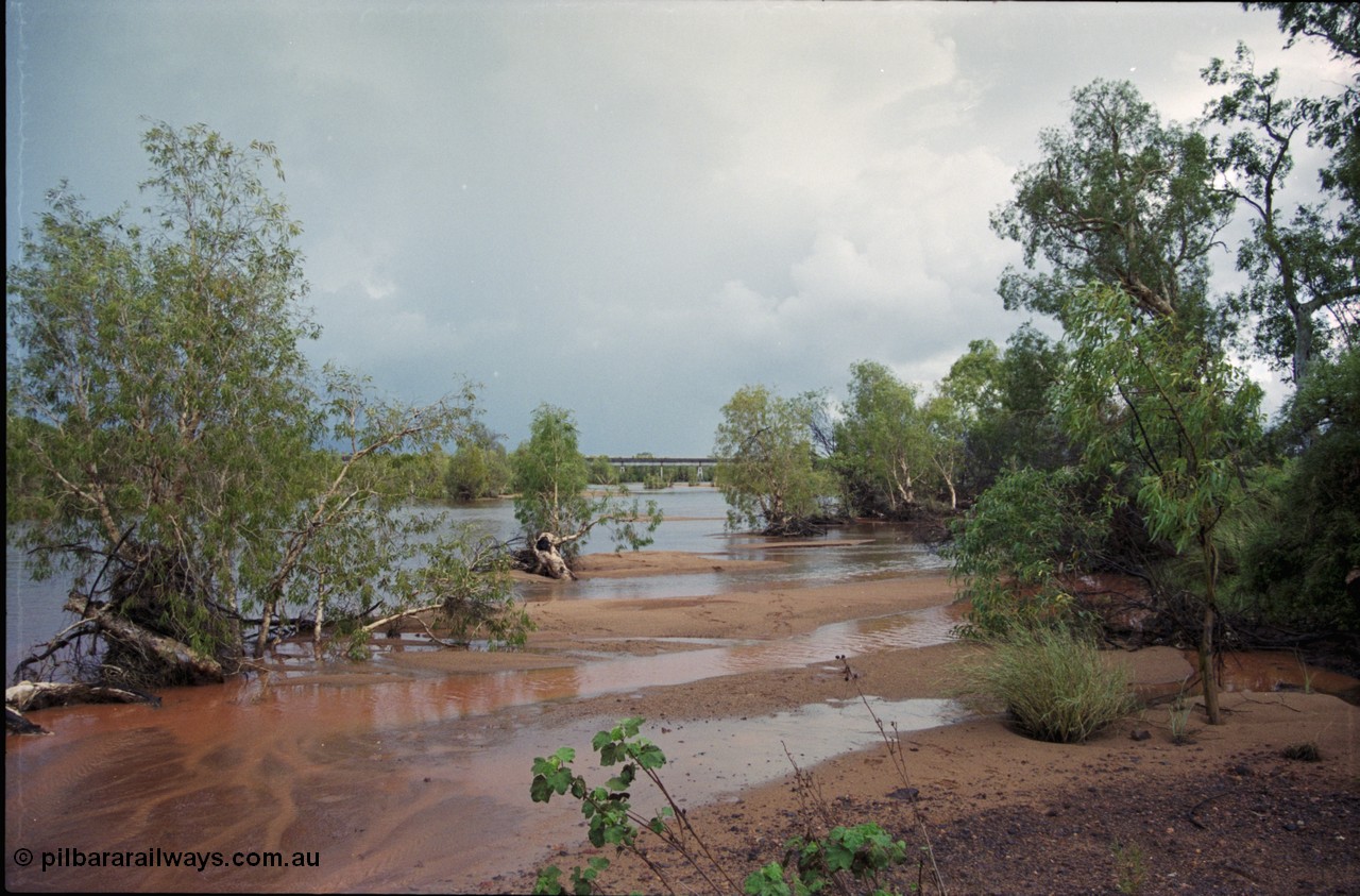 225-01
Walla siding area, the East Turner River is in flood, flowing with the bridge at the 55.5 km in the background.
