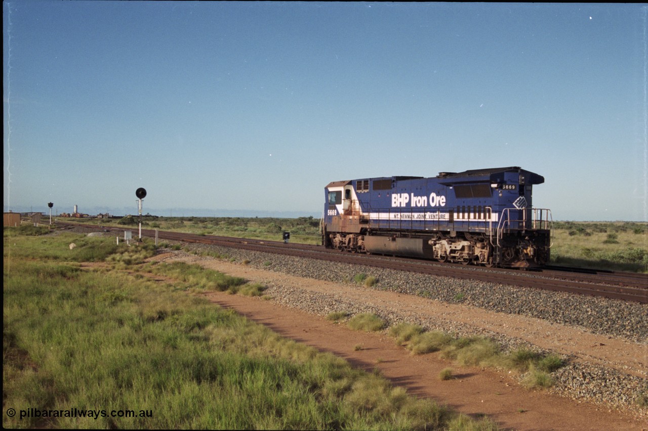 225-02
Bing siding at the 17.5 km, Goninan rebuild CM40-8MEFI GE loco 5669 'Beilun' serial 8412-02 / 95-160 was the last Dash 8 built for BHP Iron Ore, seen here sitting at BNN 6 signal awaiting a path, note the CCTV camera mounted under the radiator wing as a trial for single man crewing when long end leading. [url=https://goo.gl/maps/wYjgpDcnvqs]GeoData[/url].
Keywords: 5669;Goninan;GE;CM40-8EFI;8412-02/95-160;rebuild;Comeng-NSW;ALCo;M636C;5486;C6084-2;