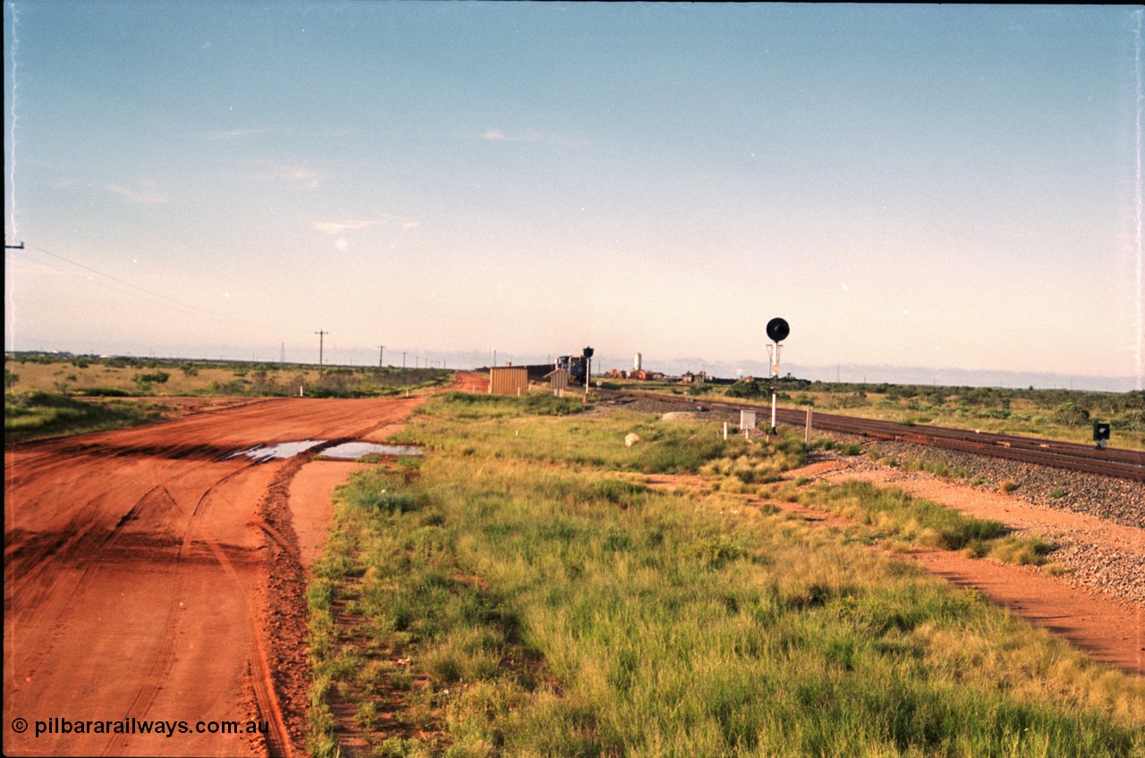 225-03
Bing siding, the afternoon empty train to Yandi was a double AC6000, 112 waggons, AC6000 and 112 waggons for a long time, here's one on approach. Flashbutt yard is to the right. [url=https://goo.gl/maps/r3bVfZz8aJS2]GeoData[/url].
