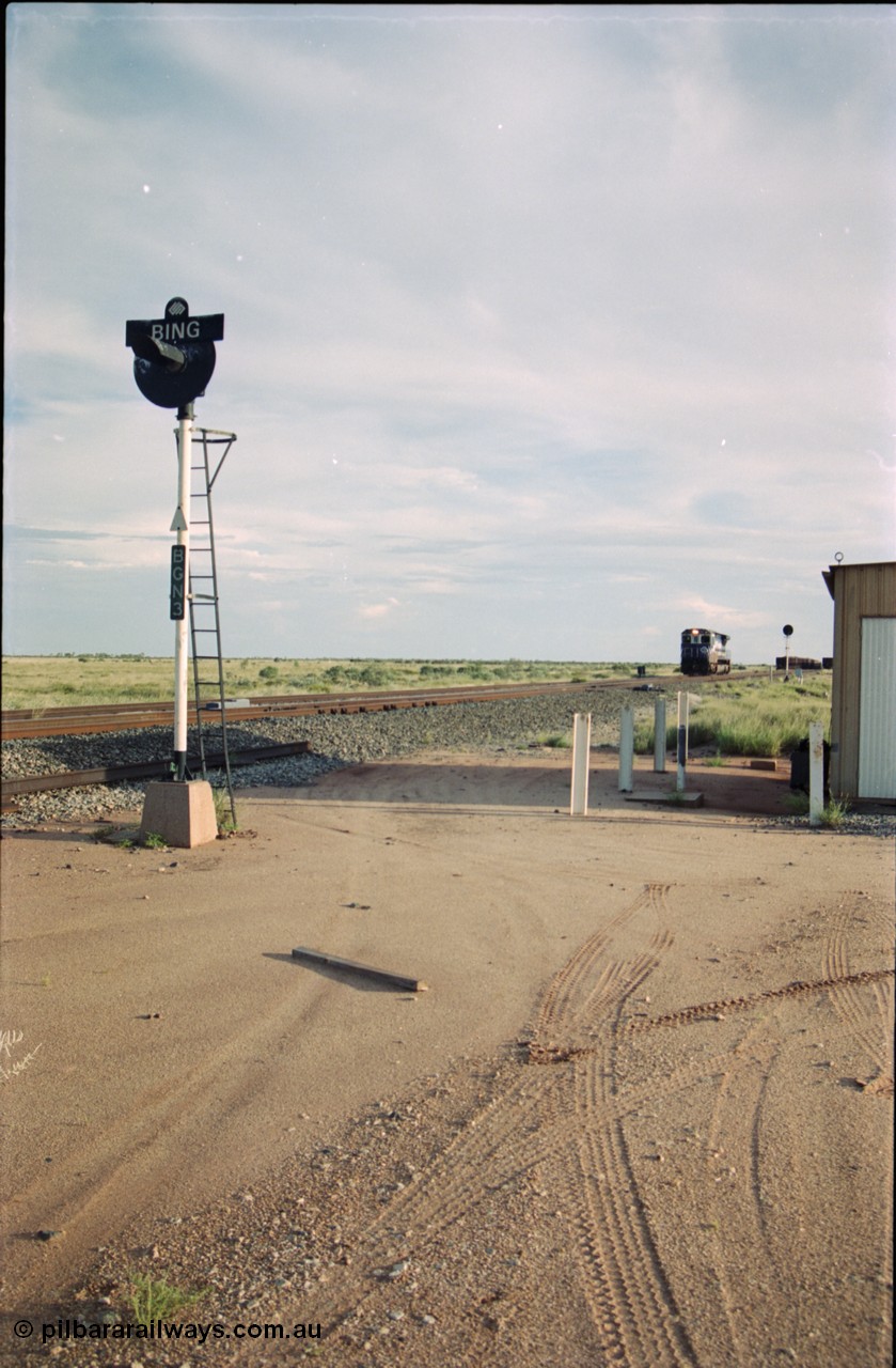 225-11
Bing siding, looking south, signal post BGN 3 arrival signal for south bound movements, empty train heading south, 5669 'Beilun' serial 8412-02 / 95-160 was the final Dash 8 rebuilt for BHP Iron Ore by Goninan as a CM40-8MEFI GE rebuilt from an ALCo, light engine on approach. [url=https://goo.gl/maps/wR1VPD4UAdn]GeoData[/url].
Keywords: 5669;Goninan;GE;CM40-8EFI;8412-02/95-160;rebuild;Comeng-NSW;ALCo;M636C;5486;C6084-2;