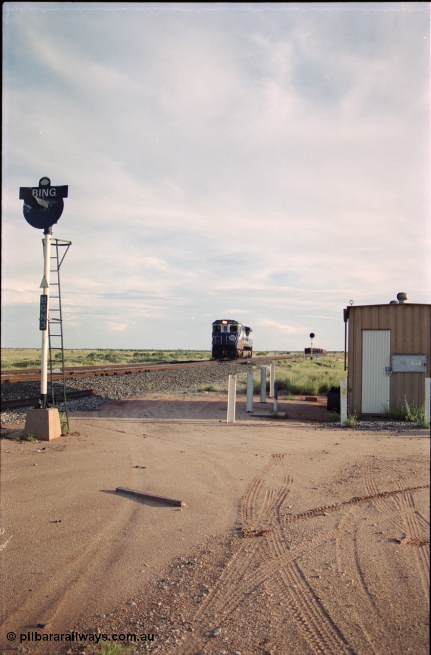 225-12
Bing siding, looking south, signal post BGN 3 arrival signal for south bound movements, empty train heading south, 5669 'Beilun' serial 8412-02 / 95-160 was the final Dash 8 rebuilt for BHP Iron Ore by Goninan as a CM40-8MEFI GE rebuilt from an ALCo, light engine on approach. [url=https://goo.gl/maps/wR1VPD4UAdn]GeoData[/url].
Keywords: 5669;Goninan;GE;CM40-8EFI;8412-02/95-160;rebuild;Comeng-NSW;ALCo;M636C;5486;C6084-2;