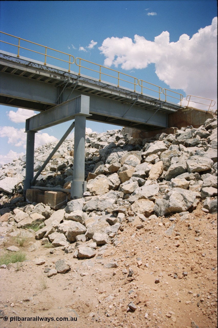 226-01
Yule River bridge showing new piles and deck to replace flood damaged piles after a cyclone that closed the line for two weeks in the late 1990s. [url=https://goo.gl/maps/G67Mat23u4P2]GeoData[/url].
