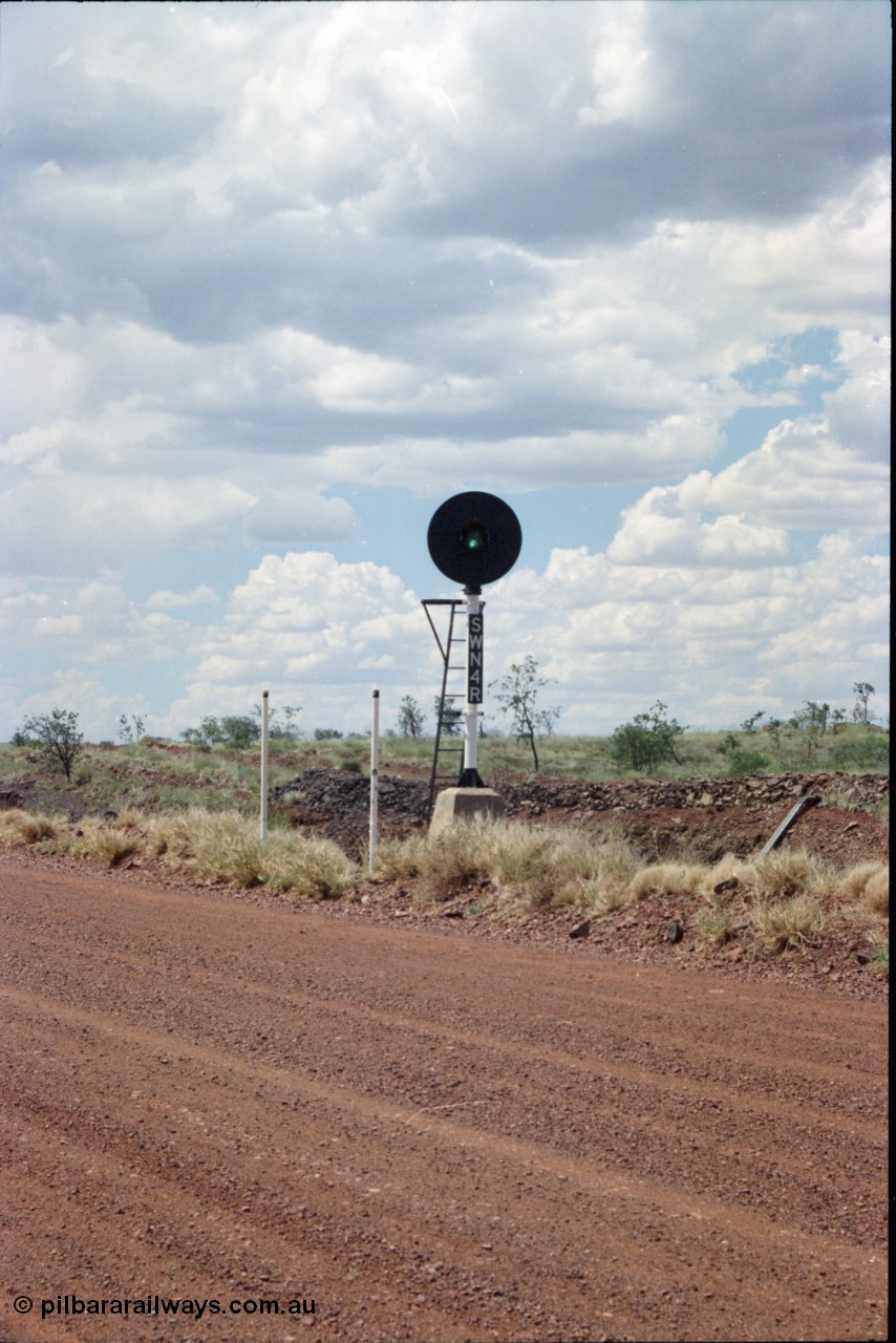 226-19
Shaw North, 216.5 km, departure repeater signal post SWN 4R for the mainline is aimed across the 700 metre radius curve that north bound trains face. [url=https://goo.gl/maps/emPzCHvnzAJ2]GeoData[/url].
