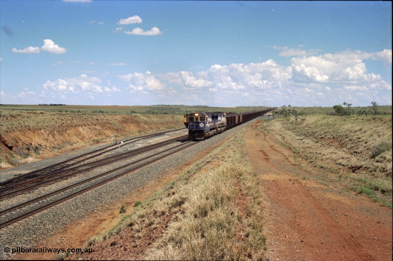 226-25
Shaw siding at the 219 km a loaded train with power from two Goninan CM40-8M GE rebuild units 5642 'Wallareenya' serial 8281-07 / 92-131 and sister unit 5636, the mid-train remotes can be seen in the distance topping the grade. [url=https://goo.gl/maps/JLjSYskHScU2]GeoData[/url].
Keywords: 5642;Goninan;GE;CM40-8M;8281-07/92-131;rebuild;AE-Goodwin;ALCo;C636;5467;G6041-3;