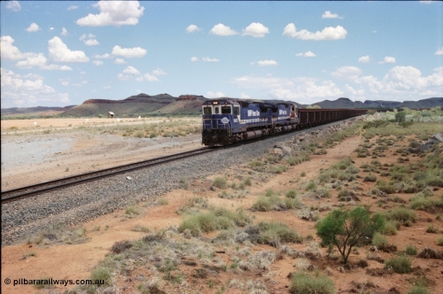 226-06
Redmont, at the 202 km, a loaded Yandi train descends the .76 percent grade with the standard of the time Double Dash 8 combination with Goninan rebuild CM40-8M GE unit 5653 'Chiba' serial 8412-10/93-144 leading sister unit 5643 down the grade. [url=https://goo.gl/maps/HYx9nXwpXfP2]GeoData[/url].
Keywords: 5653;Goninan;GE;CM40-8M;8412-10/93-144;rebuild;AE-Goodwin;ALCo;M636C;5484;G6061-5;