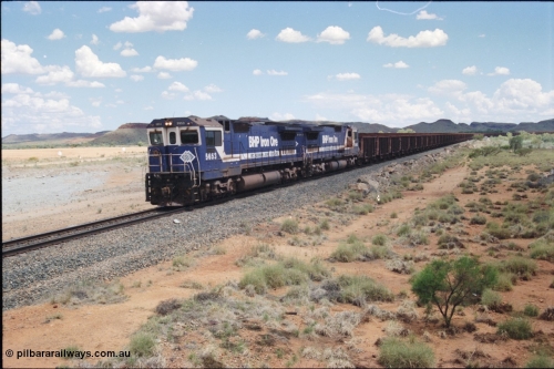 226-07
Redmont, at the 202 km, a loaded Yandi train descends the .76 percent grade with the standard of the time Double Dash 8 combination with Goninan rebuild CM40-8M GE unit 5653 'Chiba' serial 8412-10/93-144 leading sister unit 5643 down the grade. [url=https://goo.gl/maps/HYx9nXwpXfP2]GeoData[/url].
Keywords: 5653;Goninan;GE;CM40-8M;8412-10/93-144;rebuild;AE-Goodwin;ALCo;M636C;5484;G6061-5;