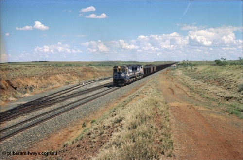 226-26
Shaw siding at the 219 km a loaded train with power from two Goninan CM40-8M GE rebuild units 5642 'Wallareenya' serial 8281-07 / 92-131 and sister unit 5636, the mid-train remotes can be seen in the distance topping the grade. [url=https://goo.gl/maps/JLjSYskHScU2]GeoData[/url].
Keywords: 5642;Goninan;GE;CM40-8M;8281-07/92-131;rebuild;AE-Goodwin;ALCo;C636;5467;G6041-3;