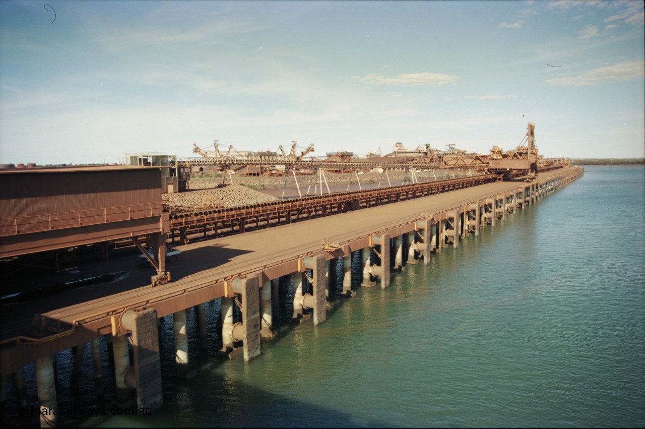 227-01
Nelson Point, view along A and B berths from Shiploader 2, Shiploader 1 on B berth, reclaimers 3 and 4 visible behind the under harbour tunnel feed conveyor. [url=https://goo.gl/maps/9YFk9Z8c7WG2]GeoData[/url].
