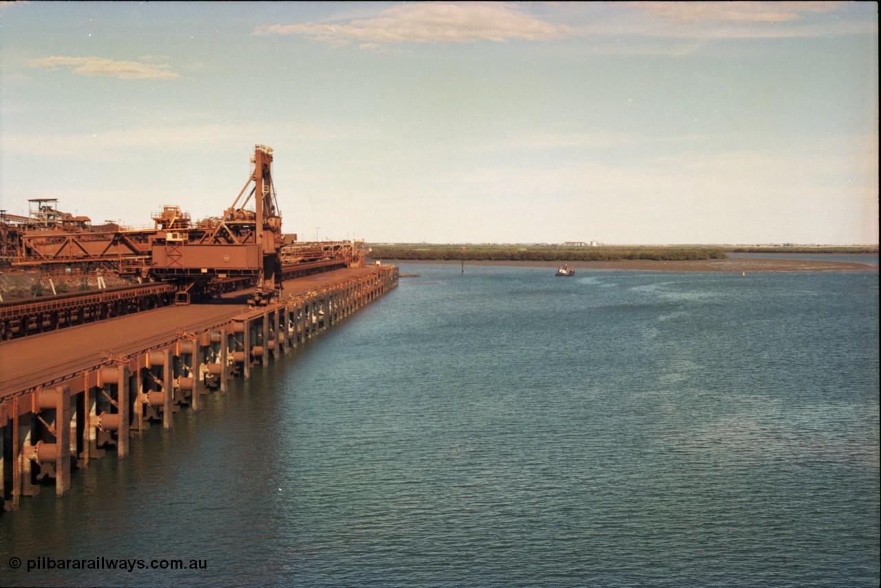 227-05
Nelson Point, view along B berth with Shiploader 1, this loader has since been replaced. In the distance now are berths E and F, Redbank Powerstation can be seen in the distance. [url=https://goo.gl/maps/9YFk9Z8c7WG2]GeoData[/url].
