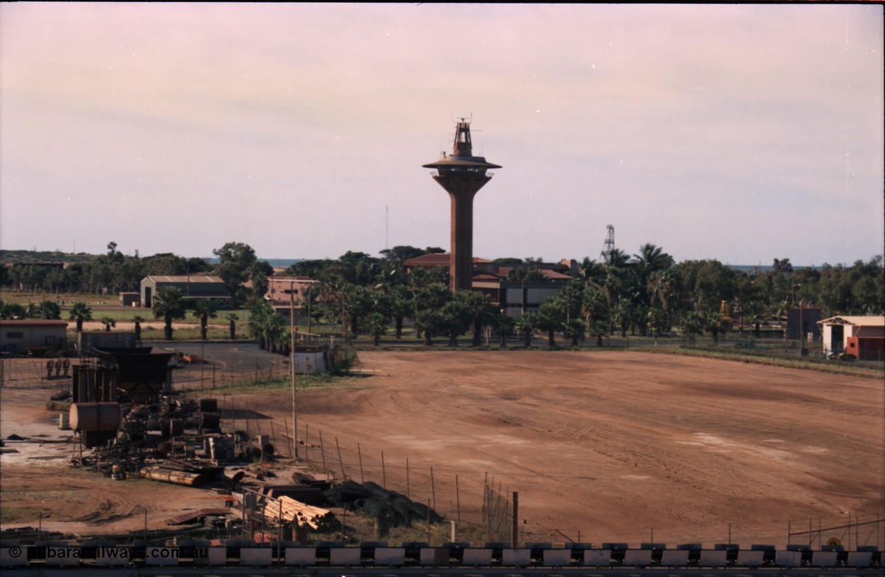 227-11
Port Hedland harbour control tower, the salt conveyor is at the bottom of the picture, the high building beyond the tower is the Esplanade Hotel, with the two story building to the right of the tower the Port Authority offices. [url=https://goo.gl/maps/1sLxDMF5tZu]GeoData[/url].
