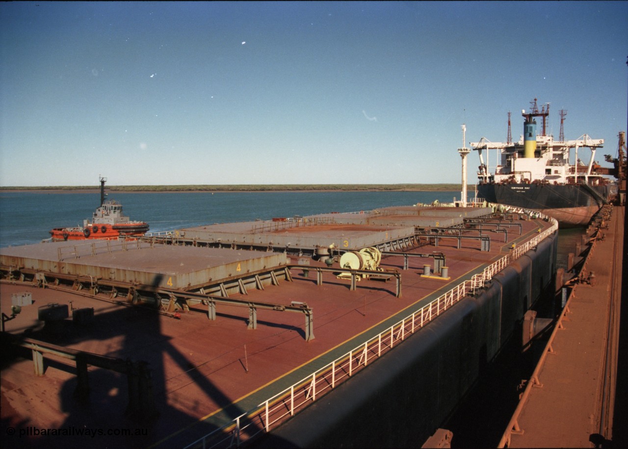 227-36
Nelson Point, tug boat Warilla, 50 ton bollard pull Z-Peller type, built by Tamar Steel Boats in Launceston in 1982, pulls a loaded carrier clear of B berth.
