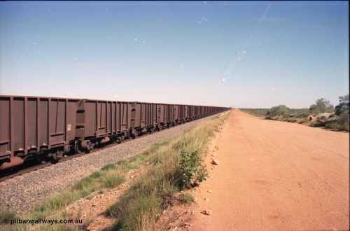 227-26
30 km looking south, empty ore train with mostly Comeng built ore waggons. [url=https://goo.gl/maps/BY7Zz4F5t822]GeoData[/url].
