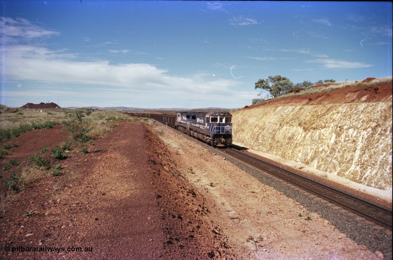 228-04
Yandi One, a loaded train coming off the balloon loop, this area is near the new MAC Junction. Stockpile and radio repeater in the background.
Keywords: 5667;Goninan;GE;CM40-8MEFI;8412-12/94-158;rebuild;Comeng-NSW;ALCo;M636C;5485;C6084-1;