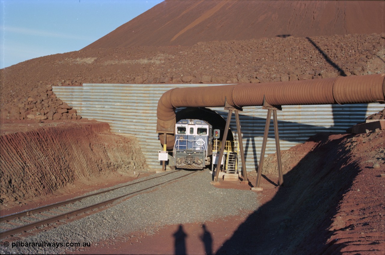 228-33
Yandi Two load-out tunnel, Goninan rebuilt GE CM40-8M model 5649 'Pohang' serial 8412-07/93-140 eases a loading train out of the tunnel at the required 1.2 km/h. 5649 started life back in 1971 as an AE Goodwin built ALCo M636 5473 serial G6047-5. Geodata [url=https://goo.gl/maps/BNPMxDyxxXC2] -22.719050, 119.040566 [/url].
Keywords: 5649;Goninan;GE;CM40-8M;8412-07/93-140;rebuild;AE-Goodwin;ALCo;M636C;5473;G6047-5;