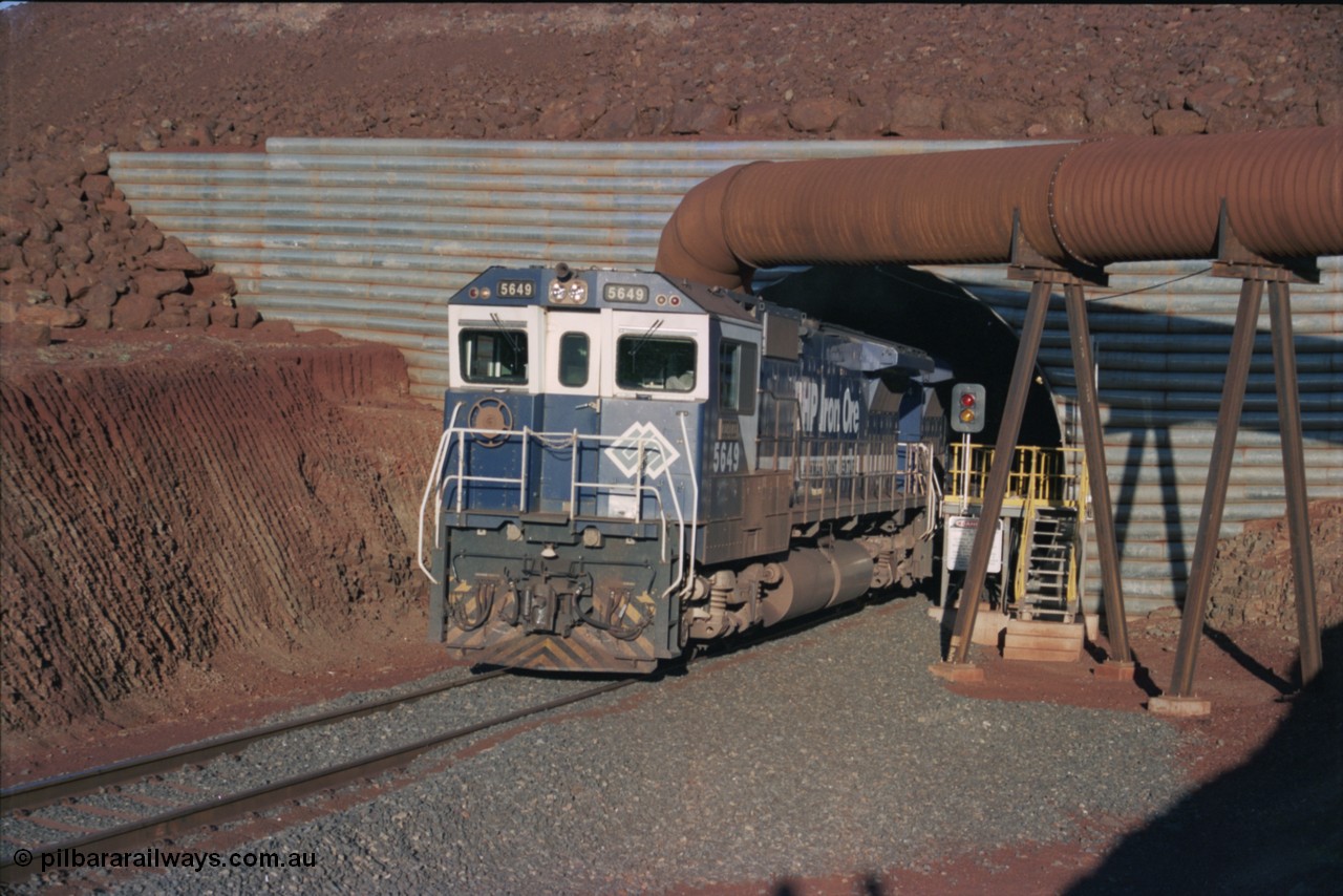 228-35
Yandi Two load-out tunnel, Goninan rebuilt GE CM40-8M model 5649 'Pohang' serial 8412-07/93-140 eases a loading train out of the tunnel at the required 1.2 km/h. 5649 started life back in 1971 as an AE Goodwin built ALCo M636 5473 serial G6047-5. Geodata [url=https://goo.gl/maps/BNPMxDyxxXC2] -22.719050, 119.040566 [/url].
Keywords: 5649;Goninan;GE;CM40-8M;8412-07/93-140;rebuild;AE-Goodwin;ALCo;M636C;5473;G6047-5;