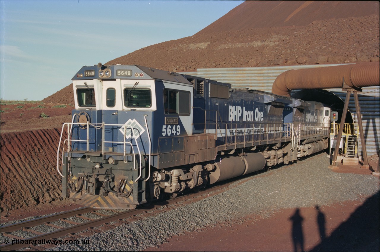 228-37
Yandi Two load-out tunnel, Goninan rebuilt GE CM40-8M model 5649 'Pohang' serial 8412-07/93-140 eases a loading train out of the tunnel at the required 1.2 km/h. 5649 started life back in 1971 as an AE Goodwin built ALCo M636 5473 serial G6047-5. Geodata [url=https://goo.gl/maps/BNPMxDyxxXC2] -22.719050, 119.040566 [/url].
Keywords: 5649;Goninan;GE;CM40-8M;8412-07/93-140;rebuild;AE-Goodwin;ALCo;M636C;5473;G6047-5;