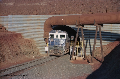 228-34
Yandi Two load-out tunnel, Goninan rebuilt GE CM40-8M model 5649 'Pohang' serial 8412-07/93-140 eases a loading train out of the tunnel at the required 1.2 km/h. 5649 started life back in 1971 as an AE Goodwin built ALCo M636 5473 serial G6047-5. Geodata [url=https://goo.gl/maps/BNPMxDyxxXC2] -22.719050, 119.040566 [/url].
Keywords: 5649;Goninan;GE;CM40-8M;8412-07/93-140;rebuild;AE-Goodwin;ALCo;M636C;5473;G6047-5;