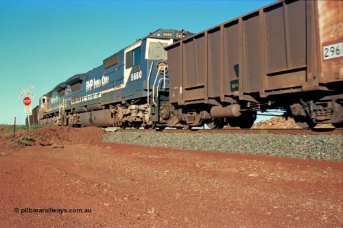 229-05
Yandi Two balloon switch looking east with an empty BHP train heading for the loadout with mid-train remote units Goninan rebuild CM40-8M GE units 5660 'Kure' serial 8412-05 / 94-151 leading sister unit 5657, grade crossing is the YT 311.5 km. [url=https://goo.gl/maps/DcycDGojcBt]GeoData[/url].
Keywords: 5660;Goninan;GE;CM40-8M;8412-05/94-151;rebuild;AE-Goodwin;ALCo;M636C;5478;G6047-10;