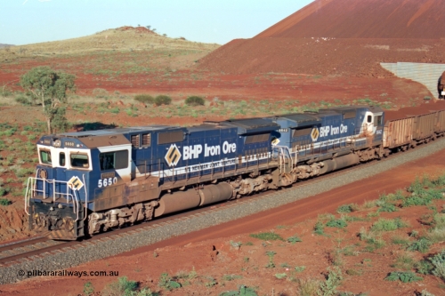 229-27
Yandi Two loadout exit side, Goninan rebuild CM40-8M GE units 5650 'Yawata' serial 8412-07 / 93-141 and sister unit 5642 drag a loading train at 1.2 km/h, both units carry the BHP Iron Ore teal and marigold livery for the logo. [url=https://goo.gl/maps/KQ3dQNrTwd42]GeoData[/url].
Keywords: 5650;Goninan;GE;CM40-8M;8412-07/93-141;rebuild;AE-Goodwin;ALCo;M636C;5481;G6061-2;