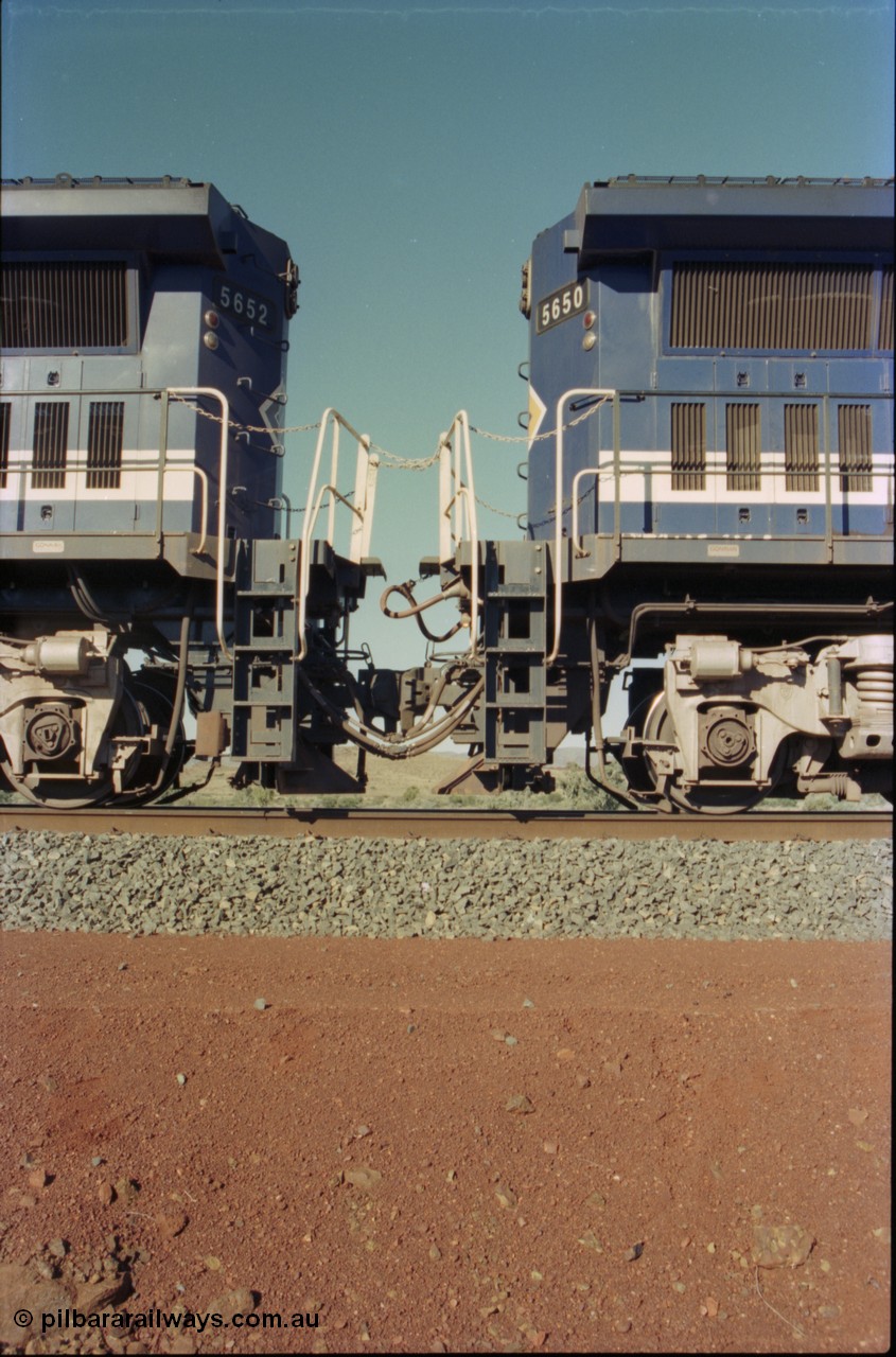 231-29
Yandi Two balloon loop, view of the connections between the two remote power units on an empty train, Goninan rebuild CM40-8M GE unit 5652 on the left is the lead, while 5650 on the right is second unit. [url=https://goo.gl/maps/3vQHZqBXNa32]GeoData[/url].
Keywords: 5652;Goninan;GE;CM40-8M;8412-09/93-143;rebuild;AE-Goodwin;ALCo;M636C;5482;G6061-3;