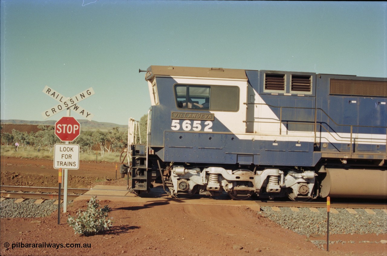 231-32
Yandi Two balloon loop 316.2 km grade crossing, BHP Iron Ore 5652 'Villanueva' serial 8412-09 / 93-143 an Goninan WA rebuild CM40-8M GE unit loads a train at 1.2 km/h as it runs across the crossing. [url=https://goo.gl/maps/N6VUeKeBS682]GeoData[/url].
Keywords: 5652;Goninan;GE;CM40-8M;8412-09/93-143;rebuild;AE-Goodwin;ALCo;M636C;5482;G6061-3;