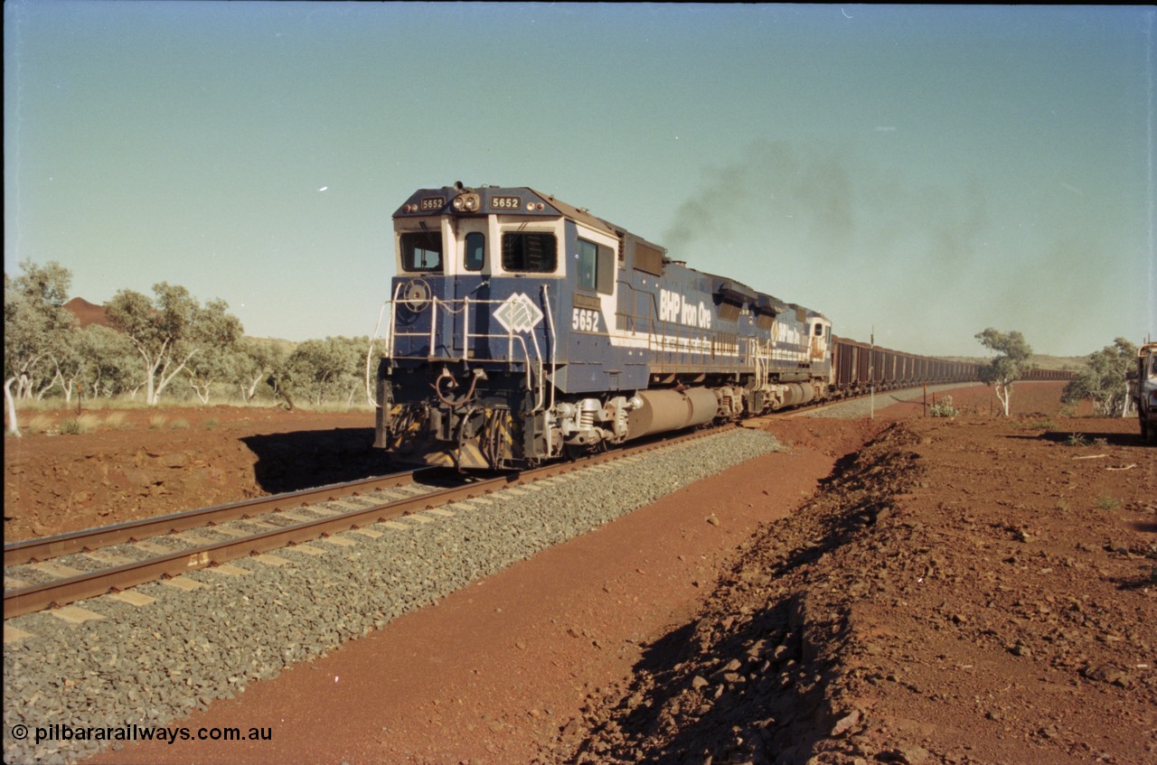 231-36
Yandi Two balloon loop 316.2 km grade crossing, BHP Iron Ore 5652 'Villanueva' serial 8412-09 / 93-143 an Goninan WA rebuild CM40-8M GE unit loads a train at 1.2 km/h with second unit 5650. [url=https://goo.gl/maps/N6VUeKeBS682]GeoData[/url].
Keywords: 5652;Goninan;GE;CM40-8M;8412-09/93-143;rebuild;AE-Goodwin;ALCo;M636C;5482;G6061-3;