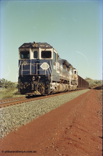 231-08
Yandi Two balloon loop, BHP Iron Ore 5652 'Villanueva' serial 8412-09 / 93-143 an Goninan WA rebuild CM40-8M GE unit loads a train at 1.2 km/h with second unit 5650. [url=https://goo.gl/maps/3vQHZqBXNa32]GeoData[/url].
Keywords: 5652;Goninan;GE;CM40-8M;8412-09/93-143;rebuild;AE-Goodwin;ALCo;M636C;5482;G6061-3;