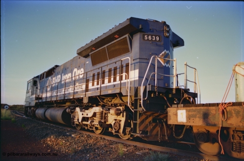 232-14
Yandi One backtrack, following a cyclone shutdown of the mainline and severe flooding around Yandi a 'mixed' freight train was operated to Yandi to deliver food, mail and diesel fuel to the mine and camp. Here BHP Iron Ore CM40-8M unit 5639 'Corunna Downs' serial 8281-03 / 92-128 idles away in the backtrack awaiting its path back to Port Hedland with flat waggon 6703, four fuel tank waggons and a broken ore waggon. February 1997. [url=https://goo.gl/maps/6c1WFqjYSg42]GeoData[/url].
Keywords: 5639;Goninan;GE;CM40-8M;8281-03/92-128;rebuild;AE-Goodwin;ALCo;C636;5459;G6027-3;