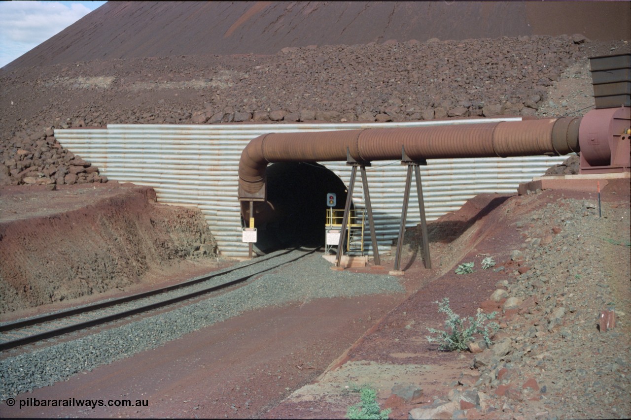 233-01
Yandi Two exit portal or loaded car side of load-out tunnel, the Yandi Two load-out has two load-out stations or vaults to allow to different products to be loaded. Only one vault is used at a time. [url=https://goo.gl/maps/RgJfYGtPXb52]GeoData[/url].
