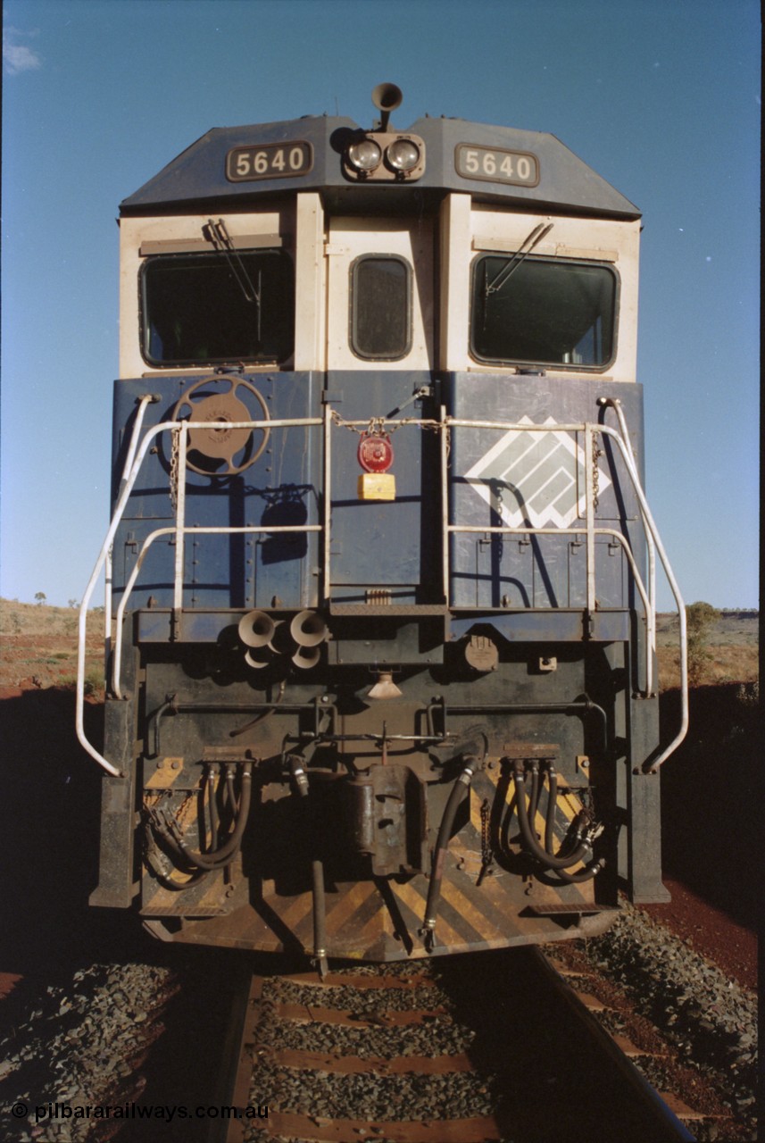 234-04
Yandi Two, BHP Iron Ore Goninan rebuild CM40-8M GE unit 5640 'Ethel Creek' serial 8281-05 / 92-129 is on the rear of a 240 waggon loaded train, this configuration was trialled for a time with two Dash 8 locos, 120 waggons, Dash 8, 120 waggons and Dash 8. As this series of rebuilds has no marker lights not the red lantern attached to the hand rail. Circa 1998.
Keywords: 5640;Goninan;GE;CM40-8M;8281-05/92-129;rebuild;AE-Goodwin;ALCo;M636C;5479;G6047-11;