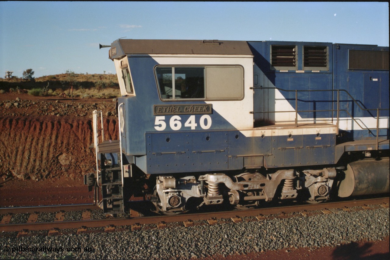 234-05
Yandi Two, BHP Iron Ore Goninan rebuild CM40-8M GE unit 5640 'Ethel Creek' serial 8281-05 / 92-129 is on the rear of a 240 waggon loaded train, this configuration was trialled for a time with two Dash 8 locos, 120 waggons, Dash 8, 120 waggons and Dash 8. View of left hand side of cab. Circa 1998.
Keywords: 5640;Goninan;GE;CM40-8M;8281-05/92-129;rebuild;AE-Goodwin;ALCo;M636C;5479;G6047-11;