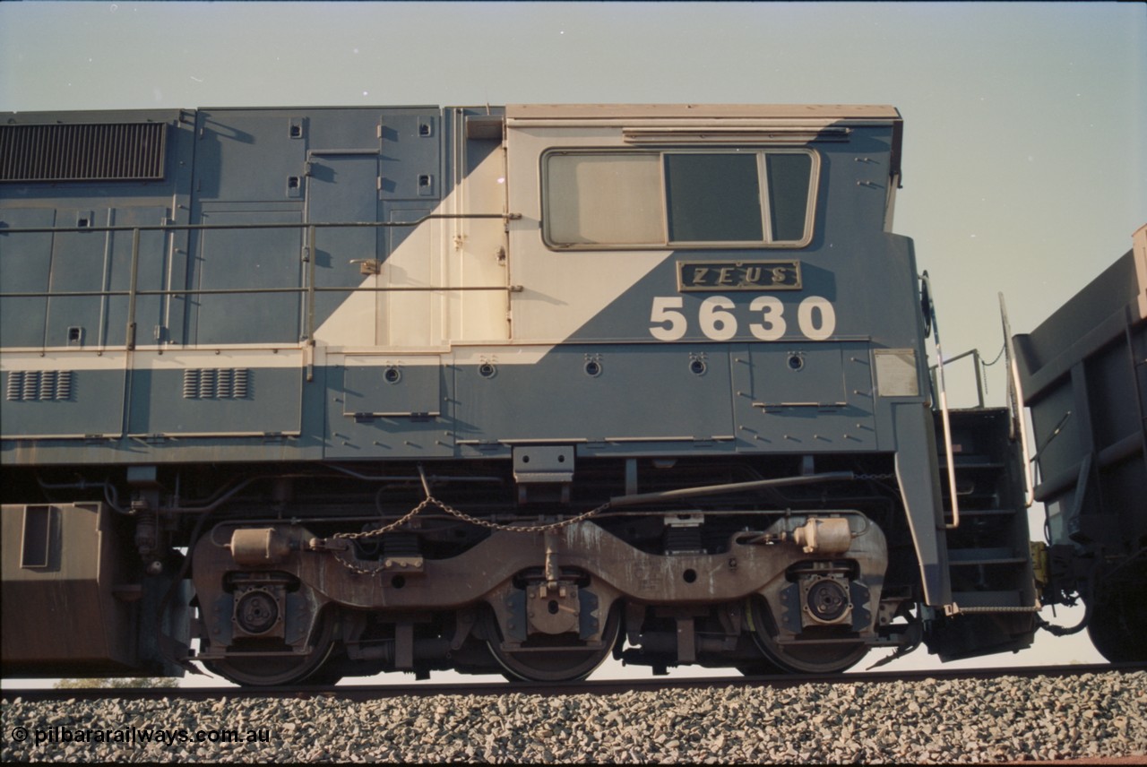 234-24
Yandi Two, BHP Iron Ore Goninan rebuild CM39-8 GE unit 5630 'Zeus' serial 5831-09 / 88-079 is second unit on the front of a 240 waggon loaded train, drivers side cab view. Circa 1998.
Keywords: 5630;Goninan;GE;CM39-8;5831-09/88-079;